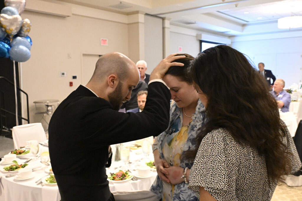 A priest giving a blessing